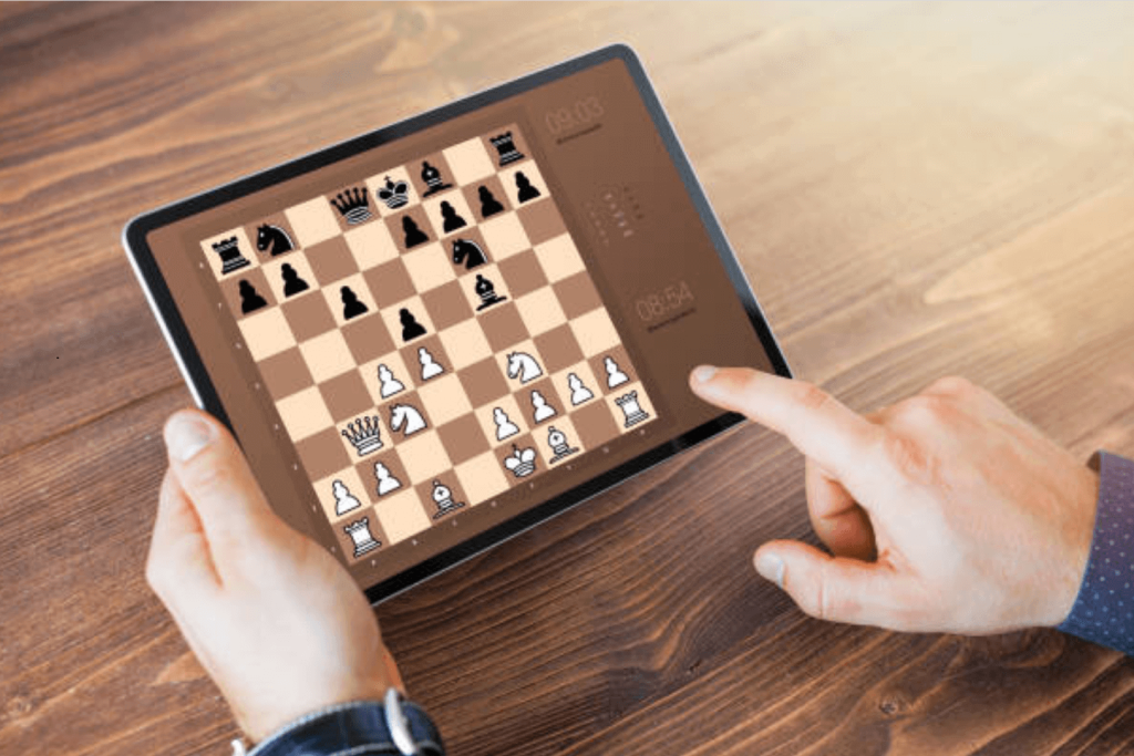 Playing chess online. Studying how to play chess online. Stock